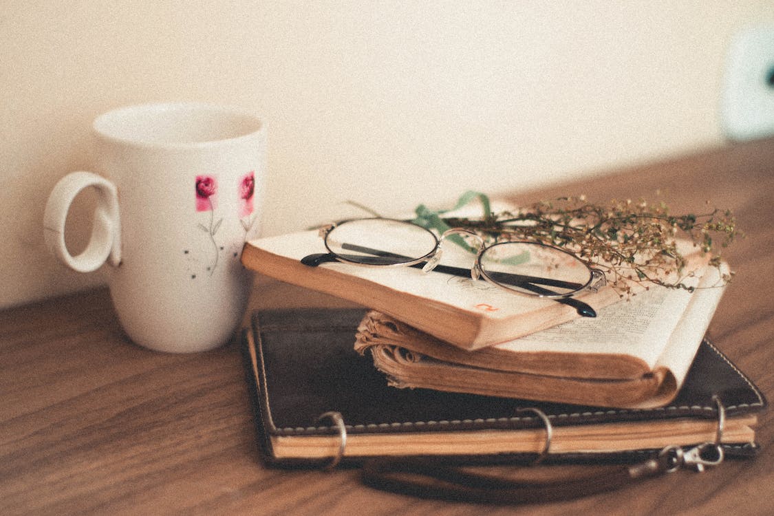 Free White Ceramic Mug on Brown Wooden Table Stock Photo